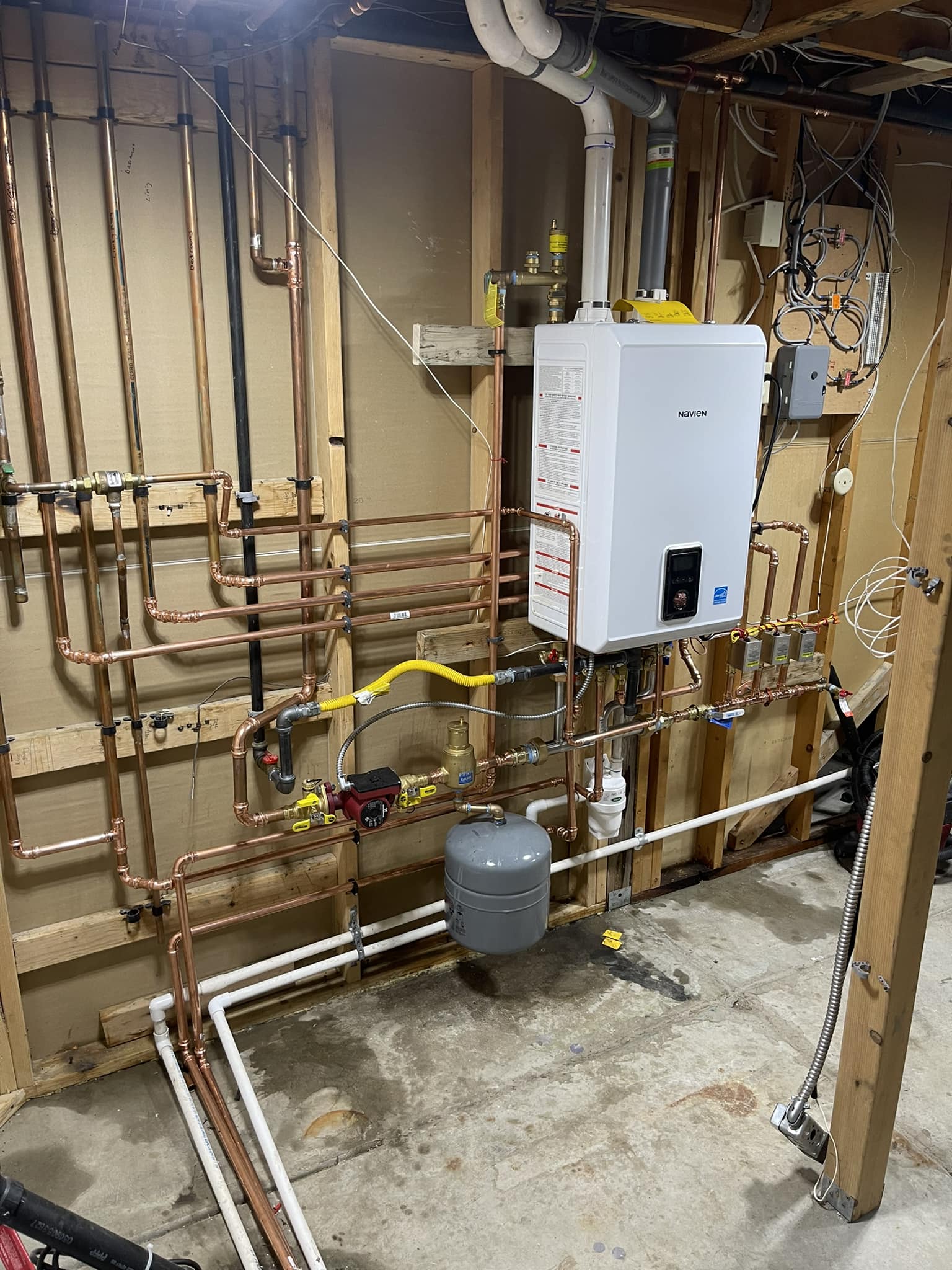 Tankless water heater installation with copper piping